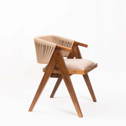 Wooden chair with woven backrest on a white background