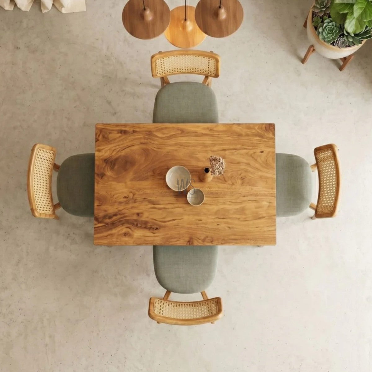 Wooden dining table with chairs in a minimalistic room.