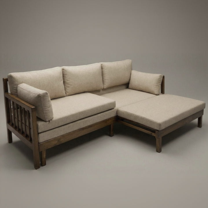 Beige sectional sofa with wooden frame on a gray background