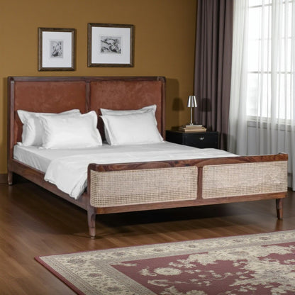 Wooden bed with white bedding in a bedroom setting