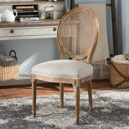 Wooden chair with wicker backrest in a room setting with a desk and baskets.