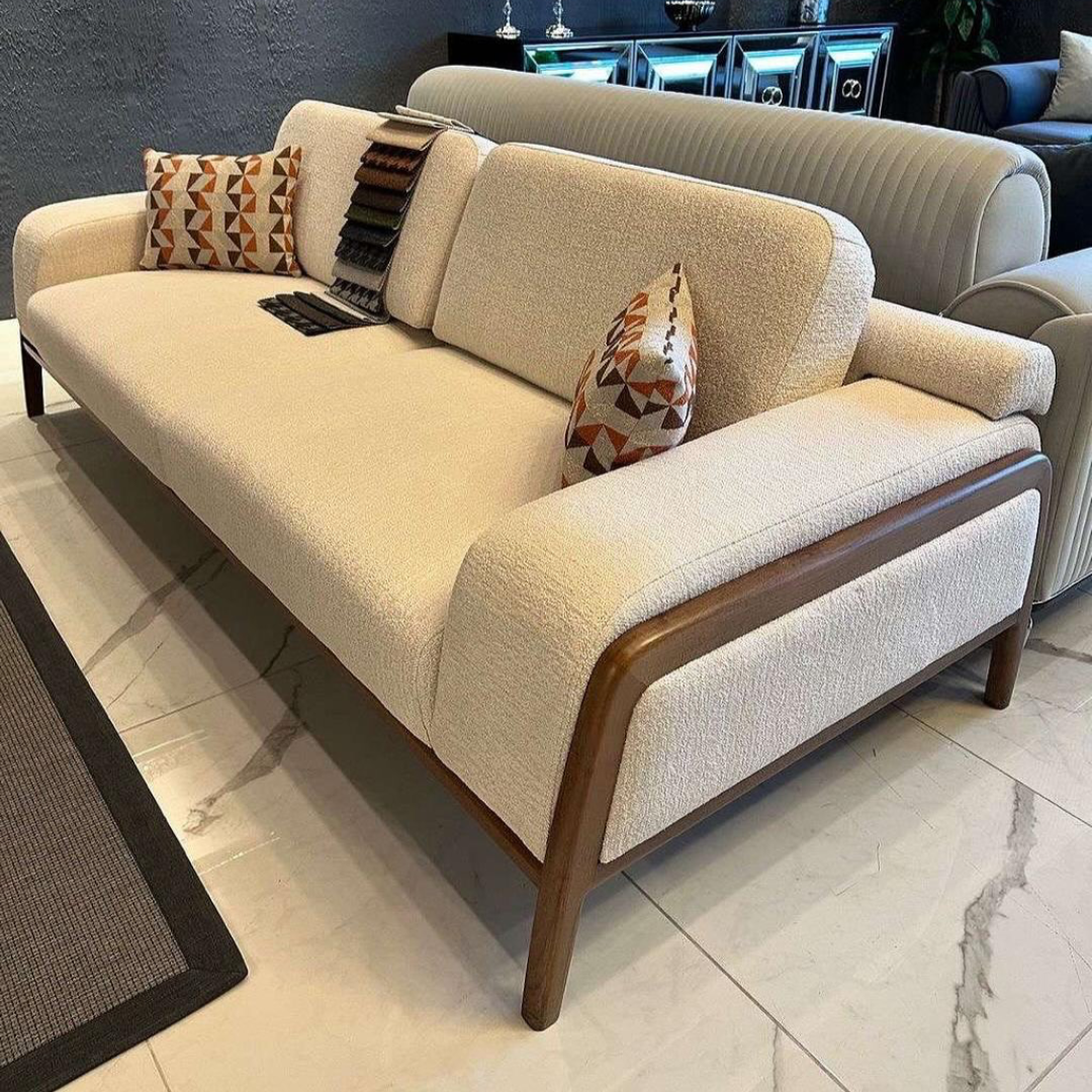 Beige sofa with wooden armrests 